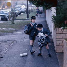 Junior School students walking along Wrixon Street, 1974